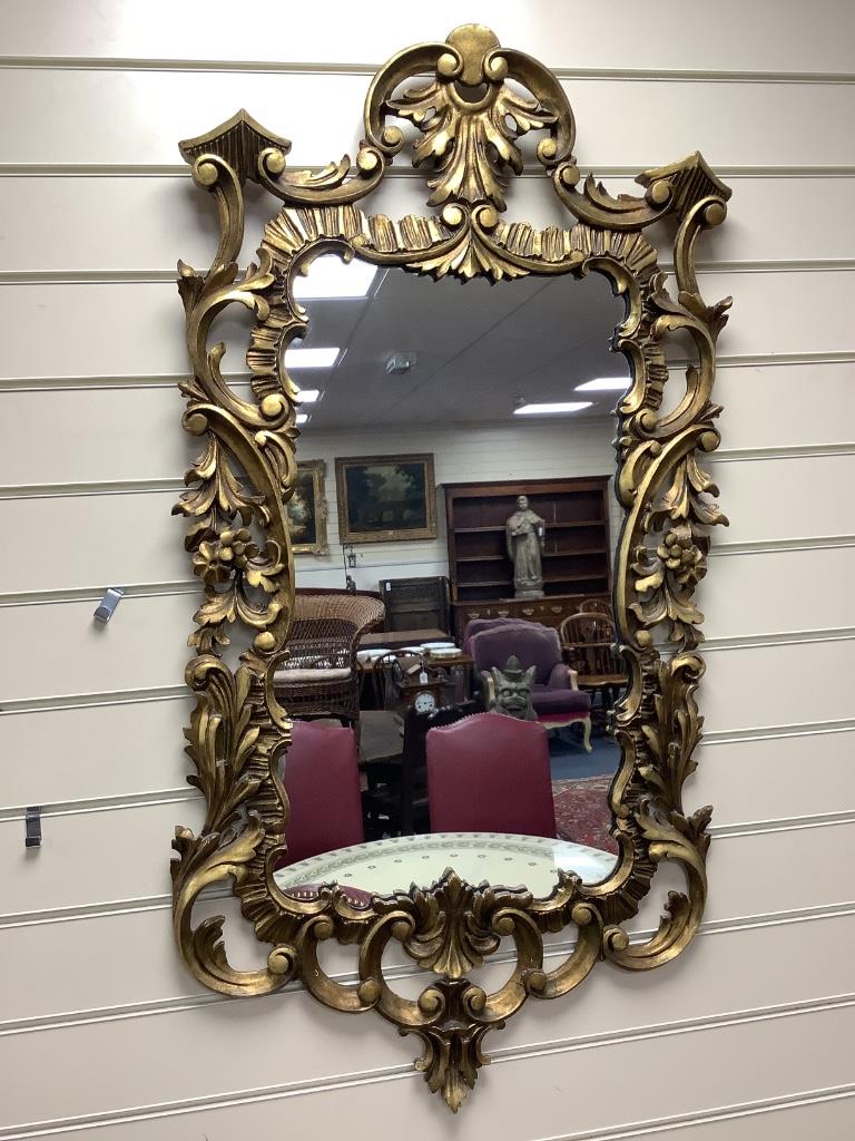 A pair of Georgian style giltwood wall mirrors, width 55cm height 106cm H 107cm